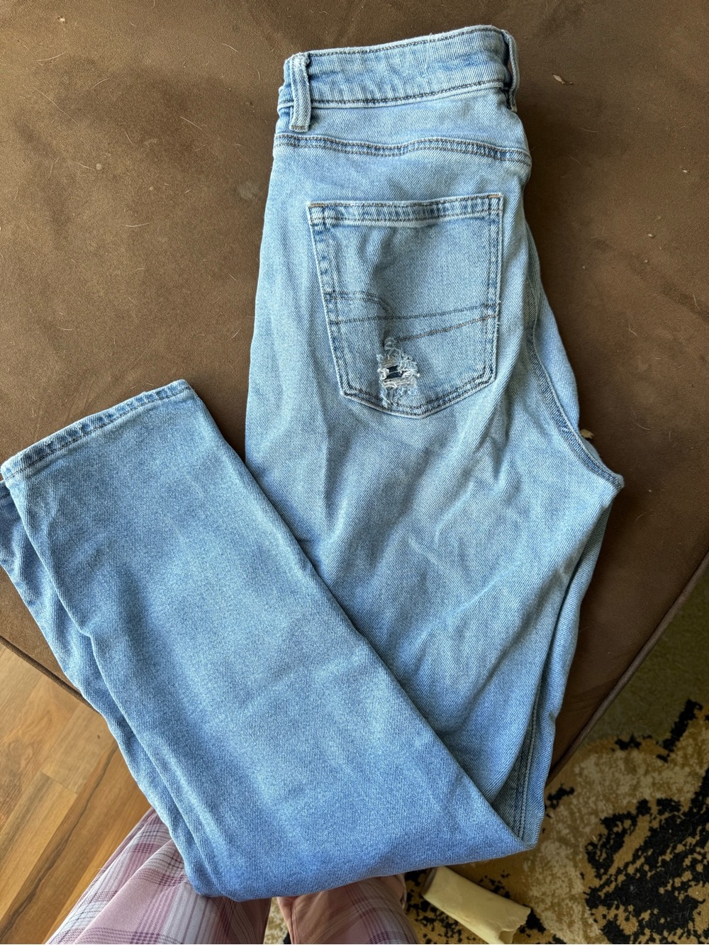Light Wash Blue Jeans with Back Pocket Distress